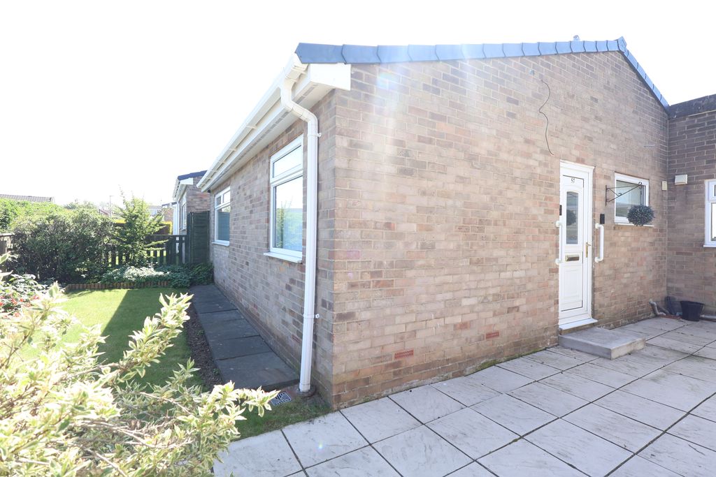 Front and side entrance.- click for photo gallery